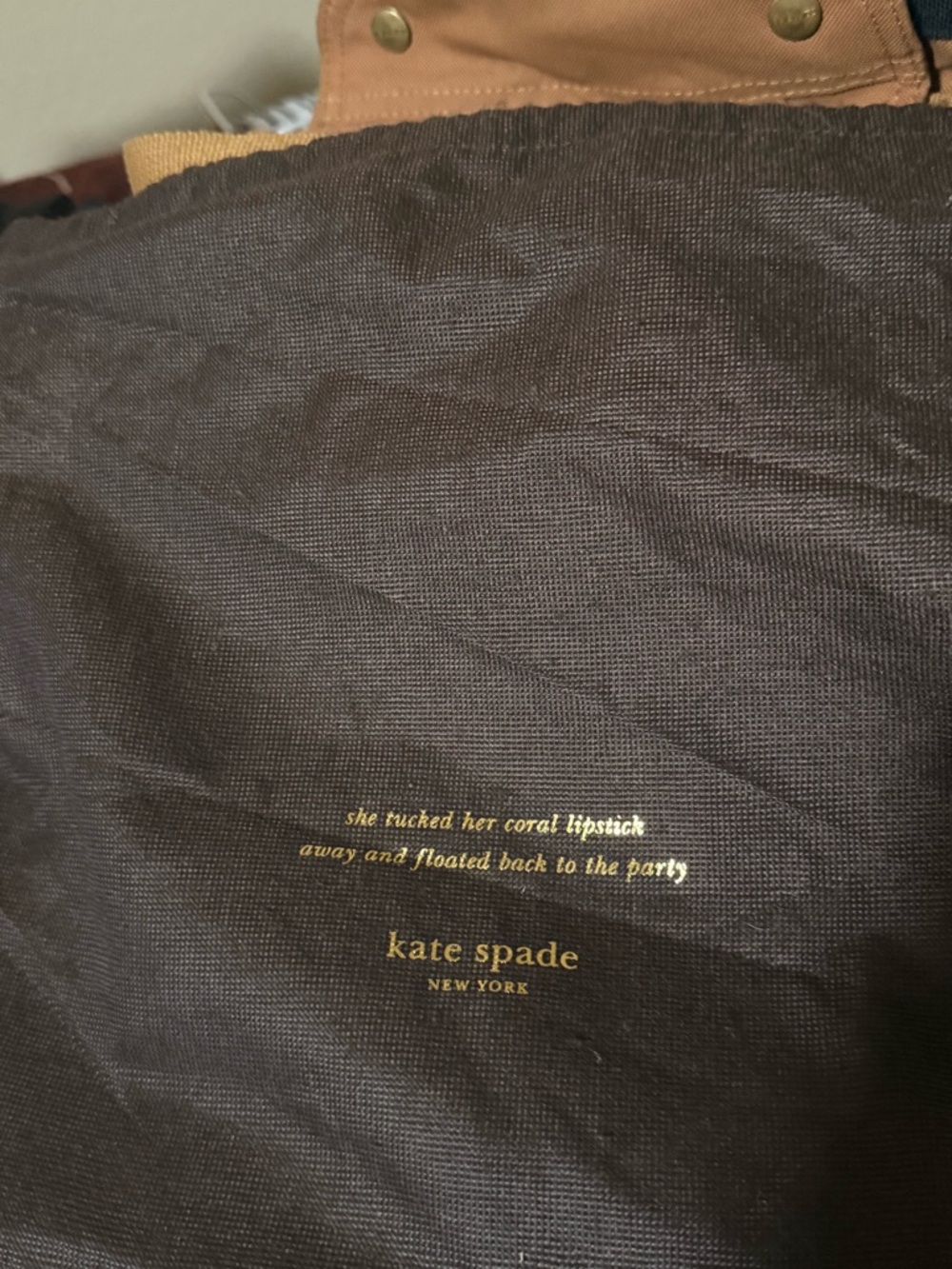 kate spade brown tote with gold logo and tan trim